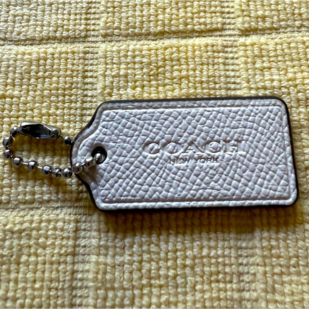 Coach Bag Tag cream color